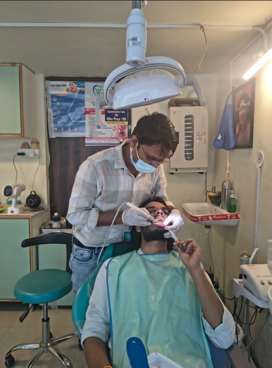 Patient receiving advanced dental care from Dr. Sanjiv Kumar